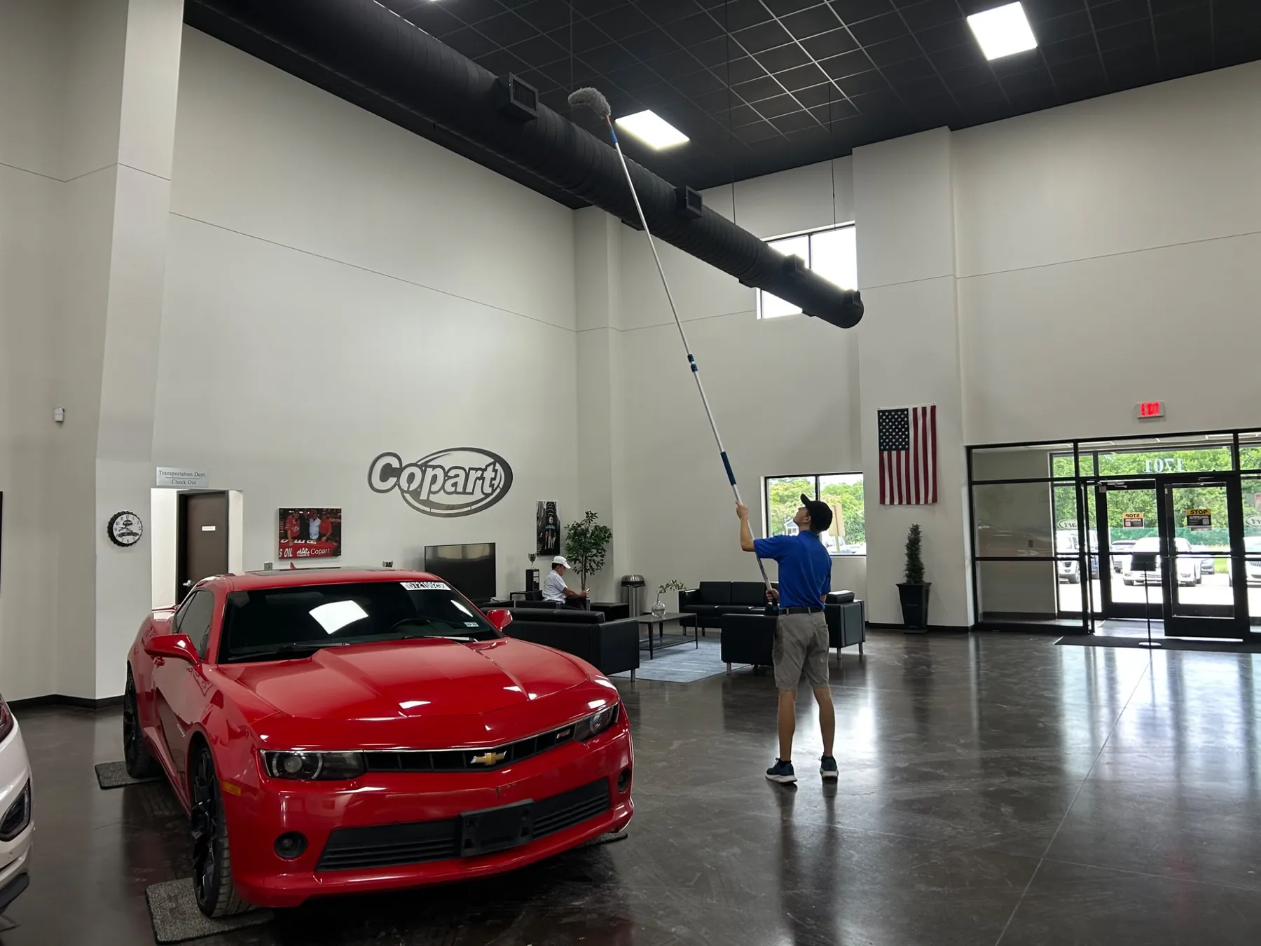 Brite-Way technician high dusting in a commercial facility