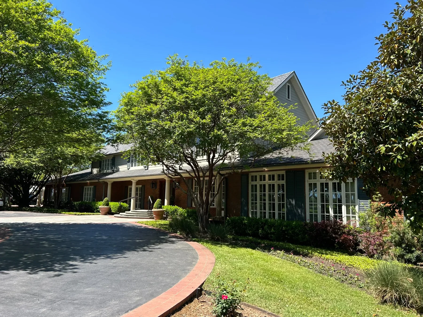Large residential estate with extensive window areas